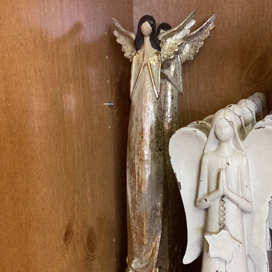 Golden angel praying
